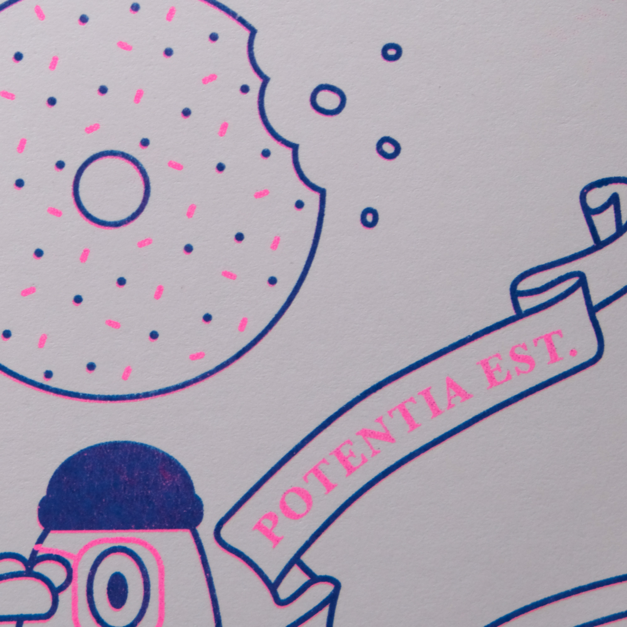A close of up a bright pink and blue risograph poster shows a pigeon wearing a hat below a colorful donut