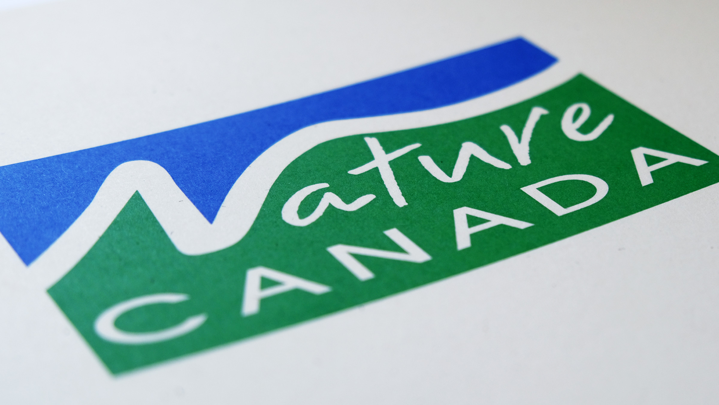 The Nature Canada logo in blue, white, and green